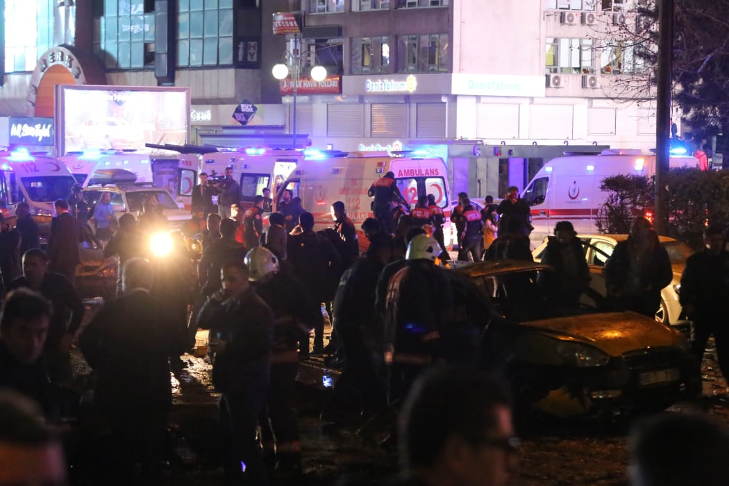 Police work near ambulances after the deadly explosion in the Turkish capital on 14 March 2016 (NZT).