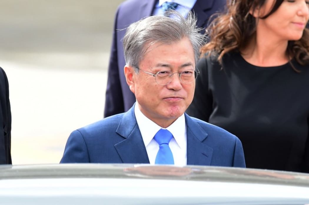 South Korea's President Moon Jae-in is pictured upon arrival at Ezeiza International airport in Buenos Aires province, on November 29, 2018. - Global leaders gather in the Argentine capital for a two-day G20 summit beginning on Friday. (Photo by MARTIN BERNETTI / AFP)