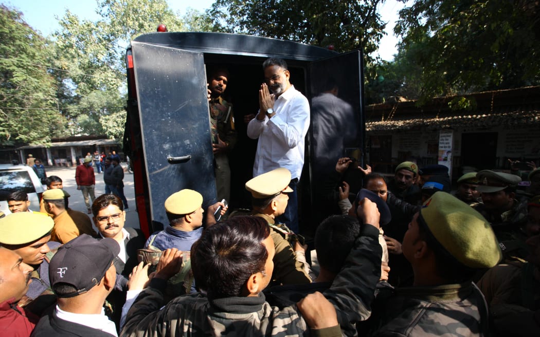 Gangster turned politician Mukhtar Ansari taken out from district court for money laundering case , in Allahabad on December 28,2022. (Photo by Ritesh Shukla ) (Photo by Ritesh Shukla/NurPhoto) (Photo by Ritesh Shukla / NurPhoto / NurPhoto via AFP)