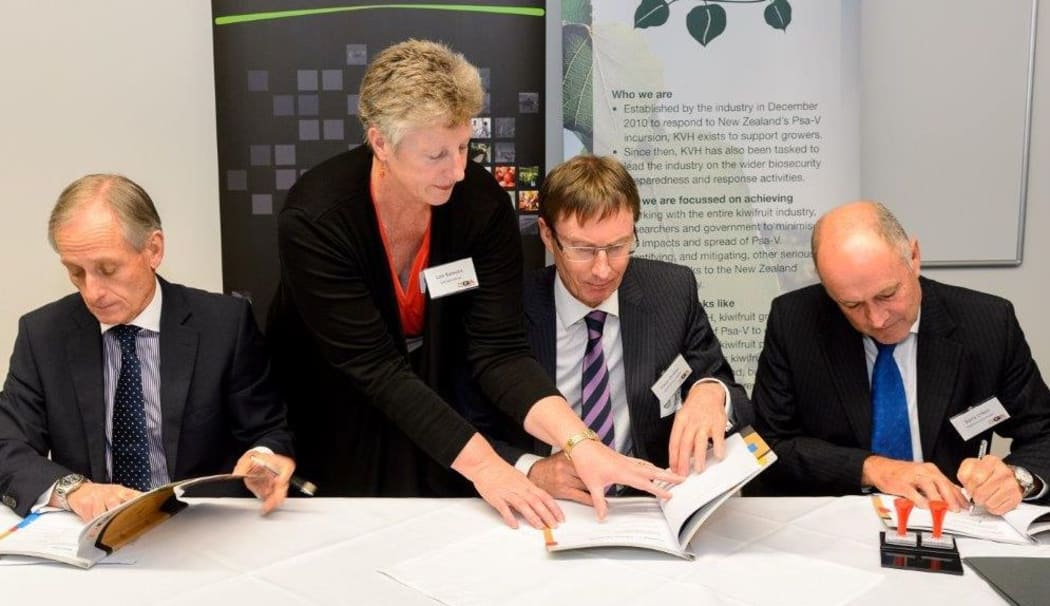 Signing the GIA Deed are (from left): Ministry for Primary Industries director general Martyn Dunne, Government Industry Agreement secretariat manager Lois Ransom, Kiwifruit Vine Health board chair Peter Ombler and Kiwifruit Vine Health chief executive Barry O'Neill.