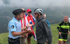 Chris Froome was mistaken by police for a fan, Froome's wife said.