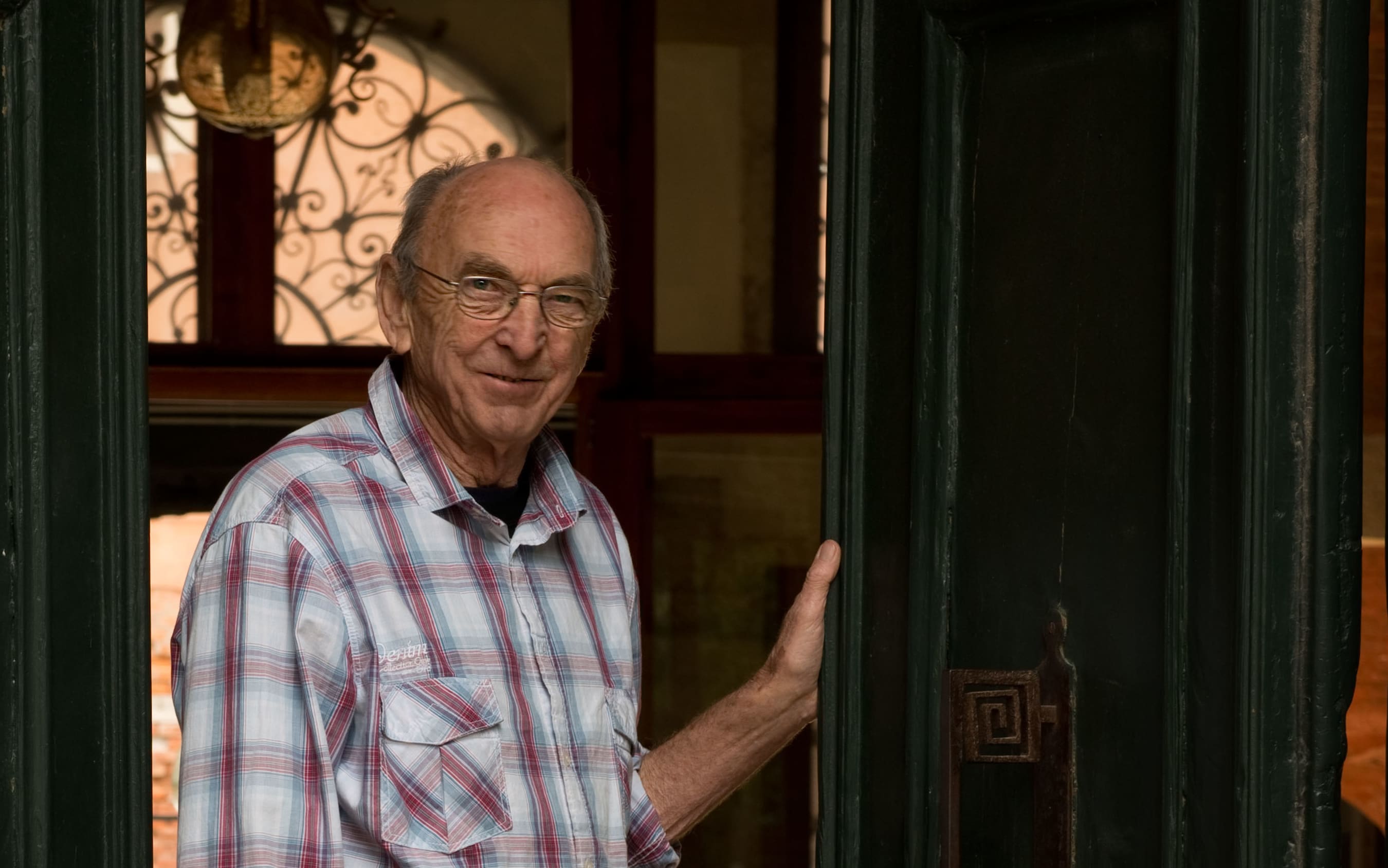 Bill Culbert in the doorway of the New Zealand pavilion in Venice.