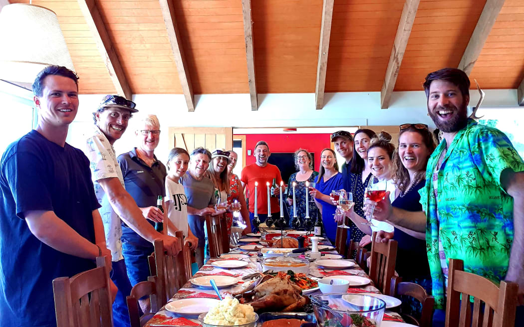 Almost every year since moving to New Zealand eight years ago, Katie Dugan has put on a 'Friendsgiving' Thanksgiving dinner for family and friends, as seen here in 2021 in Queenstown.