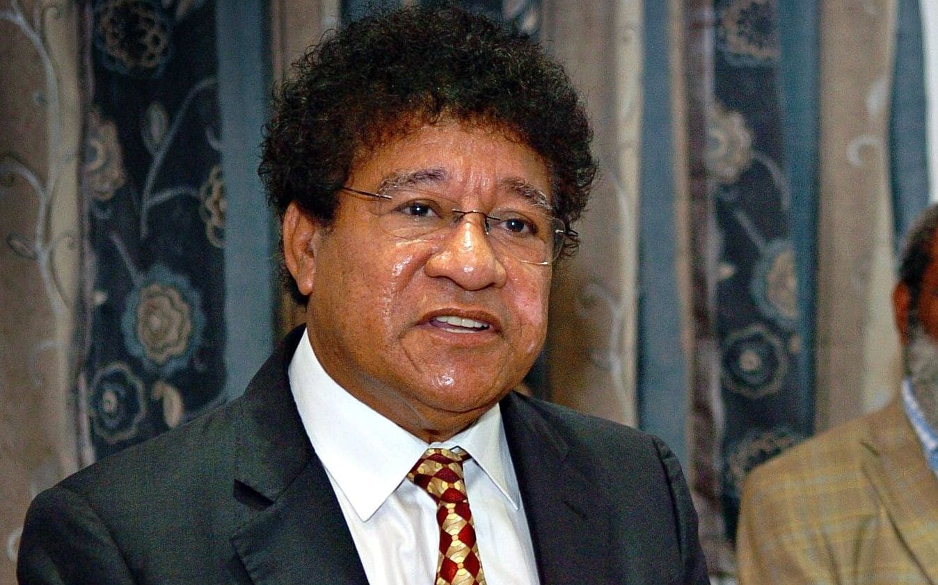 Papua New Guinea's Attorney General Ano Pala and the man he replaced in the job, Kerenga Kua.