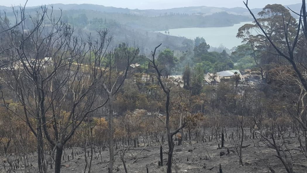 The charred remains of the Wilderland organic commune beside the Whitianga estuary,