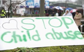 A sign at the protest at the sentencing of a couple who pleaded guilty to the manslaughter of three-year-old Moko.