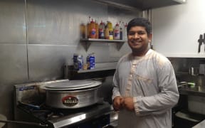 Mohammad Khaja Mohiuddin in the kitchen of his new takeaway store Indian Paradise.