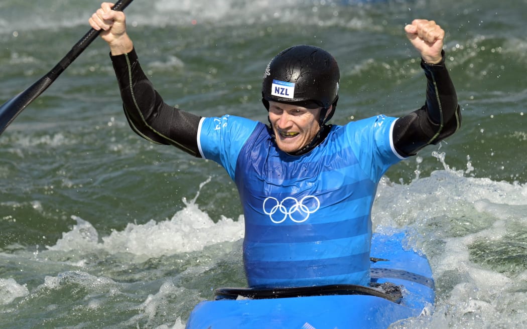 New Zealand's Finn Butcher celebrates winning in the men's kayak cross final of the canoe slalom competition at Vaires-sur-Marne Nautical Stadium in Vaires-sur-Marne during the Paris 2024 Olympic Games on August 5, 2024. (Photo by Bertrand GUAY / AFP)