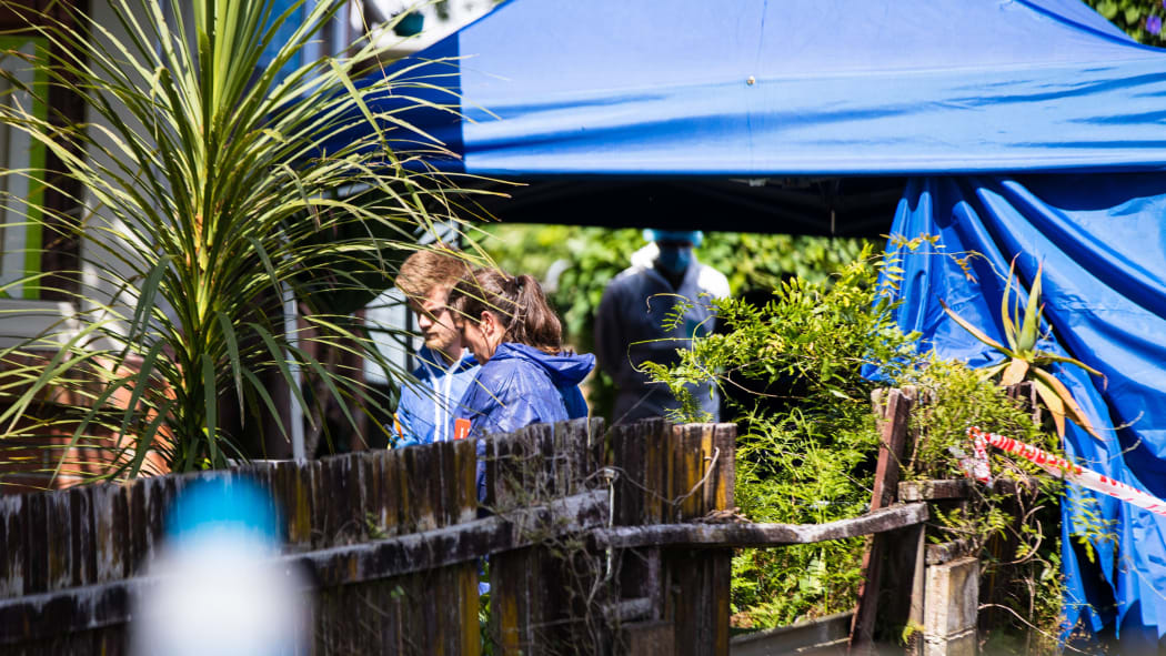 Police at murder scene in Waitaki Street, Henderson, west Auckland