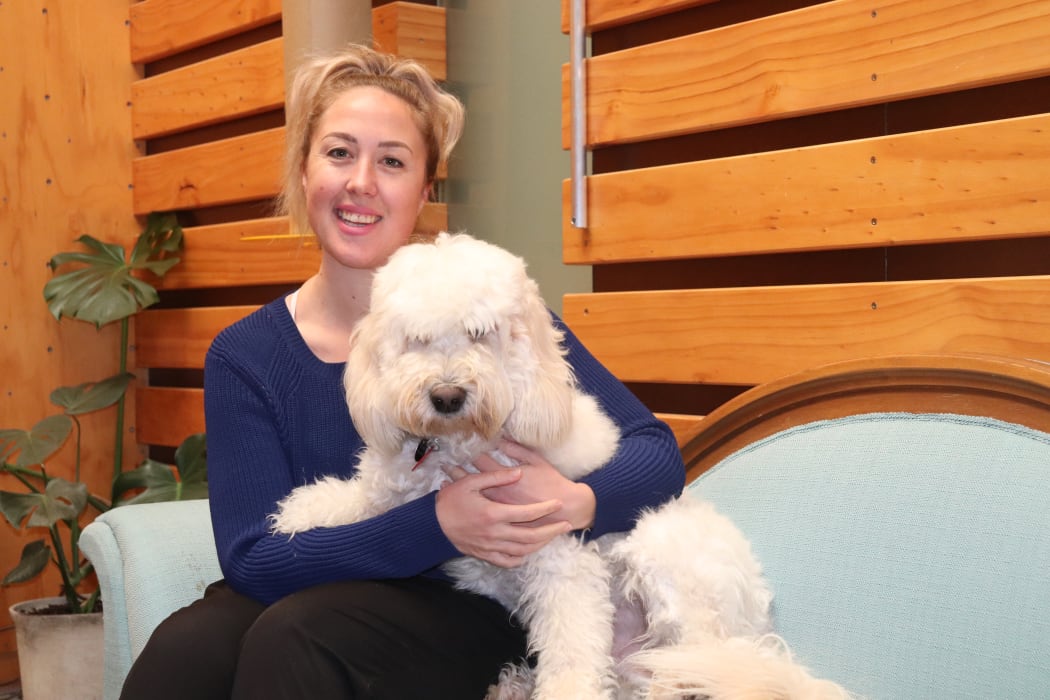 After Hours organiser Alice McKinley pictured with her dog Charlie.