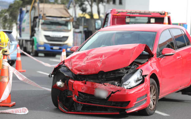 Car smashes into central Auckland building, causes extensive damage | RNZ