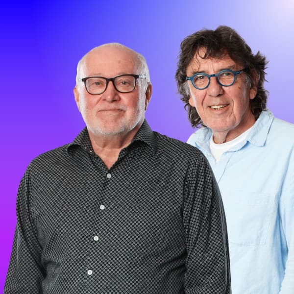 Simon Morris and Phil O’Brien are smiling at the camera.