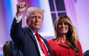 MILWAUKEE, WISCONSIN - JULY 18: Former first lady Melania Trump joins Republican presidential nominee, former U.S. President Donald Trump on stage after he officially accepted the Republican presidential nomination on the fourth day of the Republican National Convention at the Fiserv Forum on July 18, 2024 in Milwaukee, Wisconsin. Delegates, politicians, and the Republican faithful are in Milwaukee for the annual convention, concluding with former President Donald Trump accepting his party's presidential nomination. The RNC takes place from July 15-18.   Andrew Harnik/Getty Images/AFP (Photo by Andrew Harnik / GETTY IMAGES NORTH AMERICA / Getty Images via AFP)
