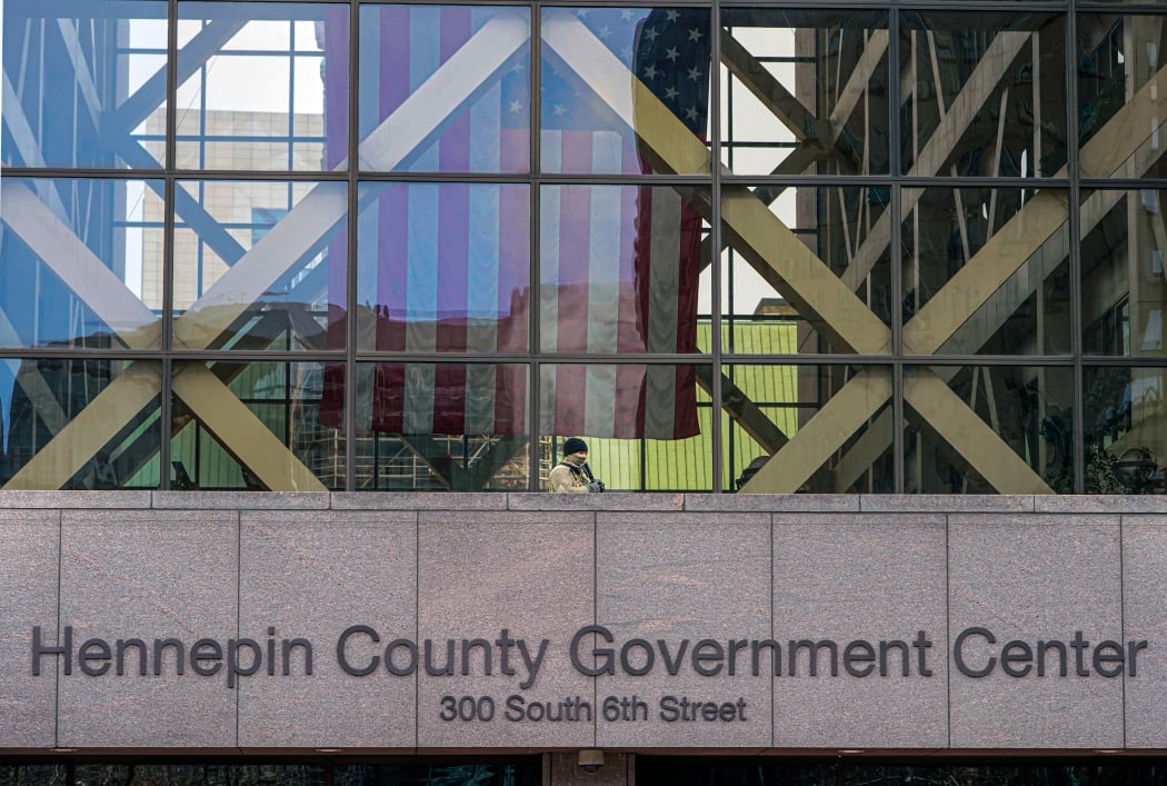 Minnesota National Guard stand guard outside the Hennepin County Government Center on the third day of jury selection in the trial of former Minneapolis Police officer Derek Chauvin on March 11, 2021 in Minneapolis, Minnesota.