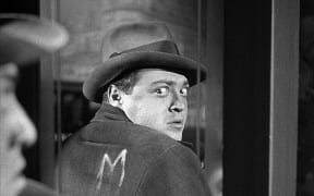 Film still from Fritz Lang's 1931 thriller M featuring Peter Lorre as the child murderer