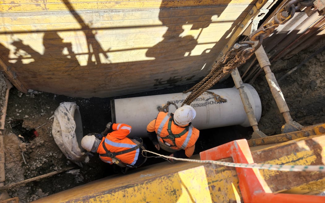 Low-carbon stormwater pipe being installed 3.5 metres deep in central Auckland on 9 October 2023.