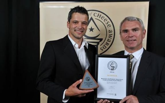 Miel Meyer winning Cheese maker of the year 2014 presented by Matt Stone from MPI.