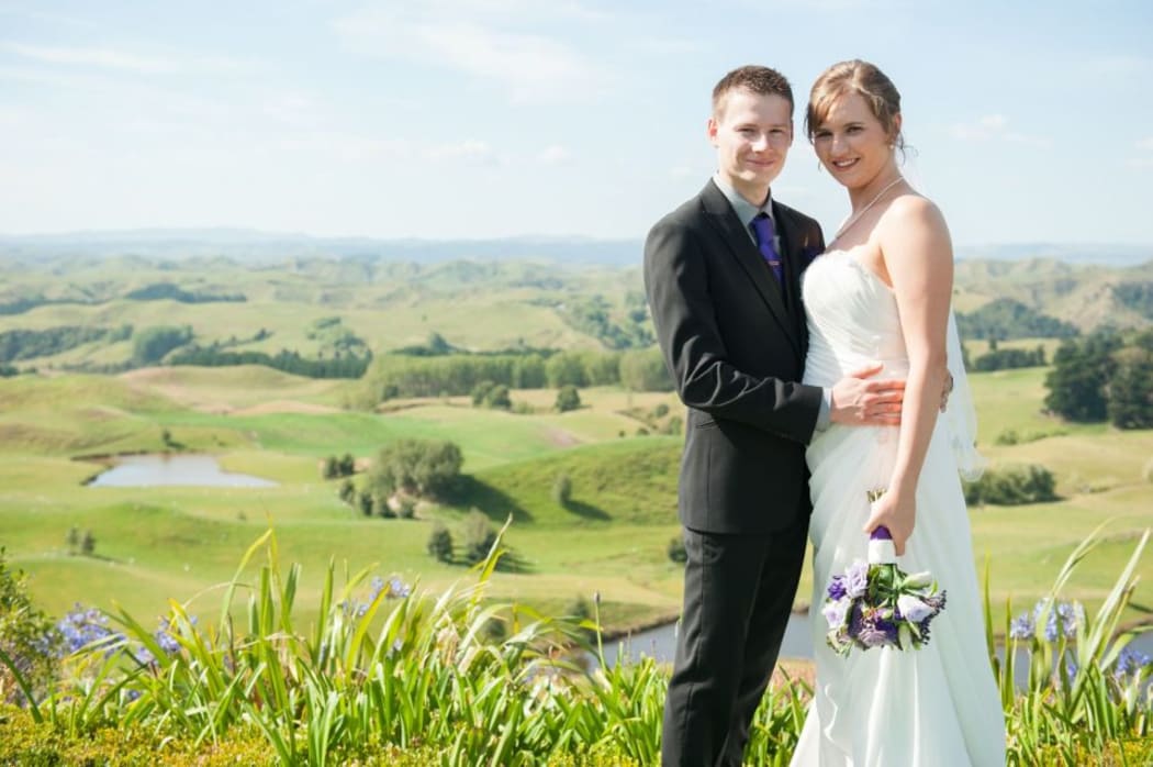 Caitlin Neal and her husband Matt at their wedding