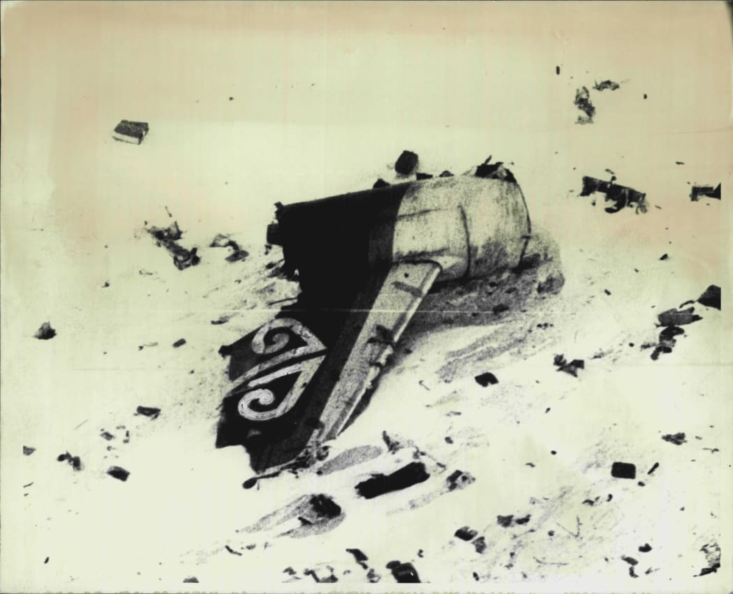 The tailpiece of the Air New Zealand bearing the 'Koru' the emblem of the airline lies amongst wreckage on Mt Erebus. The plane crashed on Wednesday killing all 257 people onboard. November 30, 1979. (Photo by Associated Press Photo)