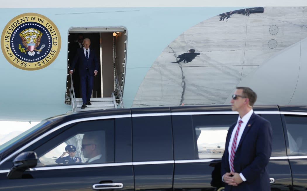 A Secret Service agent stands by as US President Joe Biden steps off Air Force One upon arrival at Harry Reid International Airport in Las Vegas, Nevada, on July 15, 2024.