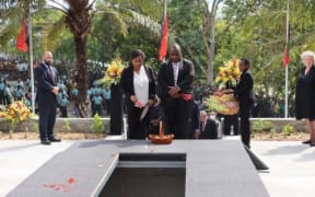 PNG Prime Minister James Marape and his wife Rachael Marape pay their respects at the final resting place of former PNG Prime Minister Sir Mekere Morauta whose son Dr James Morauta stands to the left and his wife Lady Roslyn Morata is on the far right. 8 January, 2020.