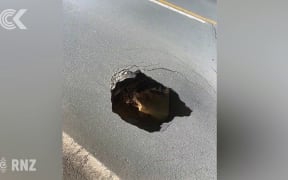 Sinkhole opens up on Tauranga road