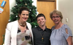 Tim Fairhall with his mother Joan Fairhall and National MP Nicola Willis, who has supported the law change allowing those with congenital disorders to access their KiwiSaver funds before age 65.