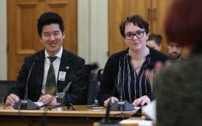 Youth MPs Shine Wu (left) and Lily Lewis (right) brief the Economic Development, Science and Innovation Select Committee on their report from Youth Parliament 2019.