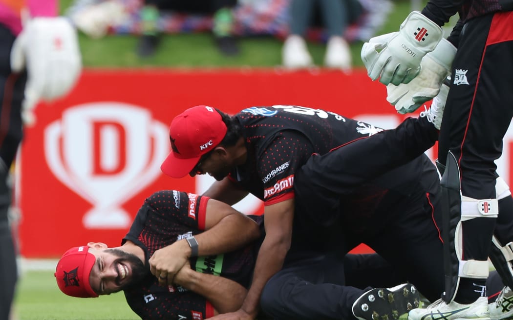 Canterbury Kings's Daryl Mitchell celebrates catching Katene Clarke from the Northern Brave during the Super Smash men's elimination final at the Basin Reserve in Wellington, 1 Feb, 2025.
