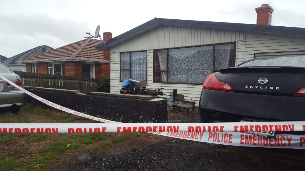 Outside the house where the 16-year-old was killed.