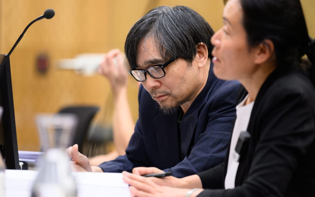 241024 KAI SCHWOERER 
Tingjun Cao and his interpreter at the High Court in Christchurch during day four of the trial for the murder of Yanfei Bao.