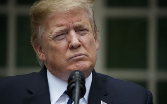 President Donald Trump delivers a statement in the Rose Garden of the White House, Wednesday, May 22, 2019, in Washington.