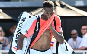 Christopher Eubanks of the USA exits the court after losing his first round singles match at the ASB Classic tennis tournament in Auckland.