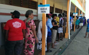 Voters queue at John Wesley College in Fiji