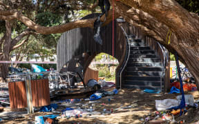 Rubbish surrounds the Parliament playground which was set ablaze by protesters yesterday.