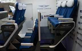 Aviation giant Airbus is "exploring some early stage concepts" based around Alejandro Núñez Vicente's Chaise Longue double-level airplane seat design. Pictured here, an early prototype of Chaise Longue on display in 2023.