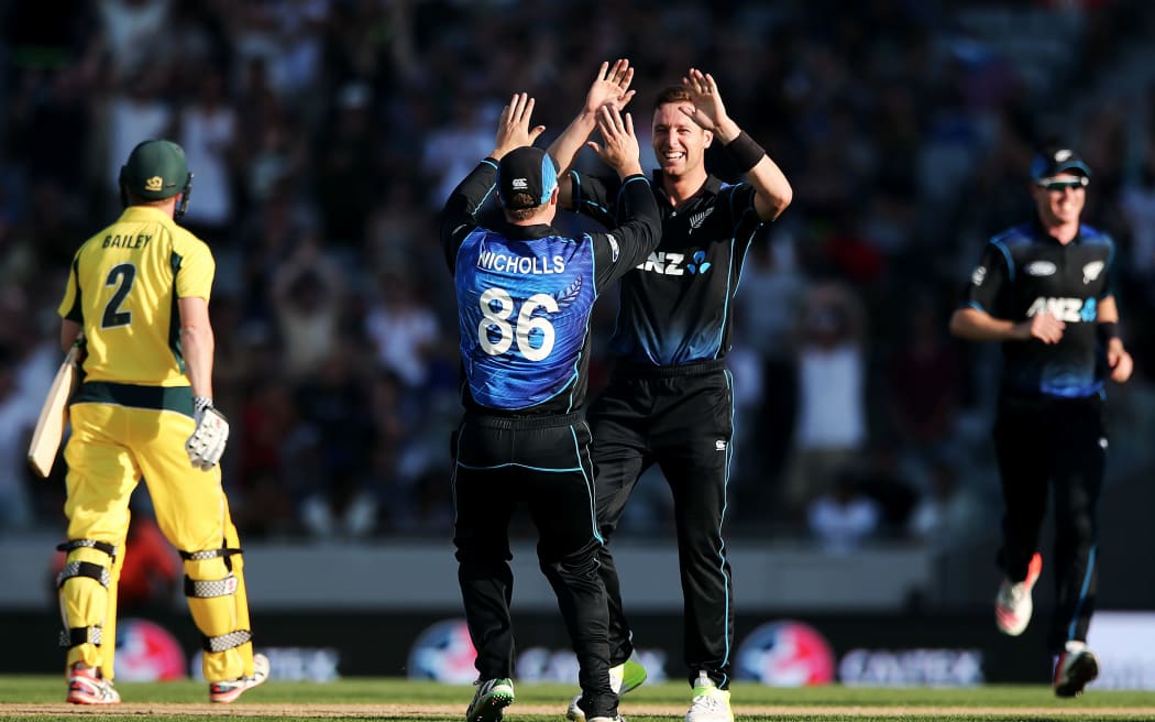Matt Henry celebrates the wicket of Australia's George Bailey at Eden Park.