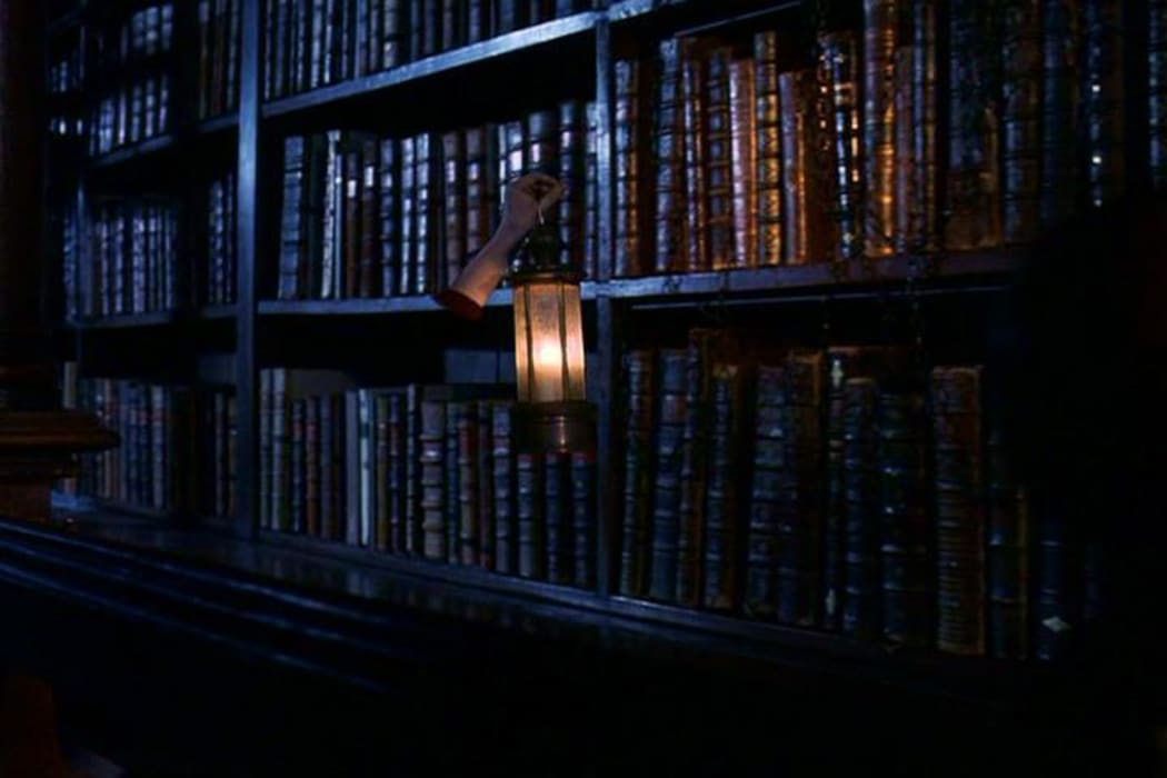 Harry Potter searches the restricted section.