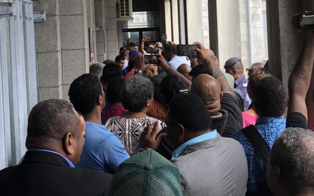 Supporters of Bainimarama and Qiliho crammed outside the Magistrates Court in Suva.