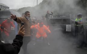 Protesters and police clash on the 23rd day of the occupation in Wellington.