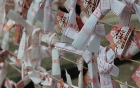 At the Yasukuni shrine, people visting can leave a note with a prayer to the Gods.