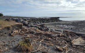 East Beach residents say the Taranaki Regional Council's "half-tide wall" is directing storm surges towards their homes.