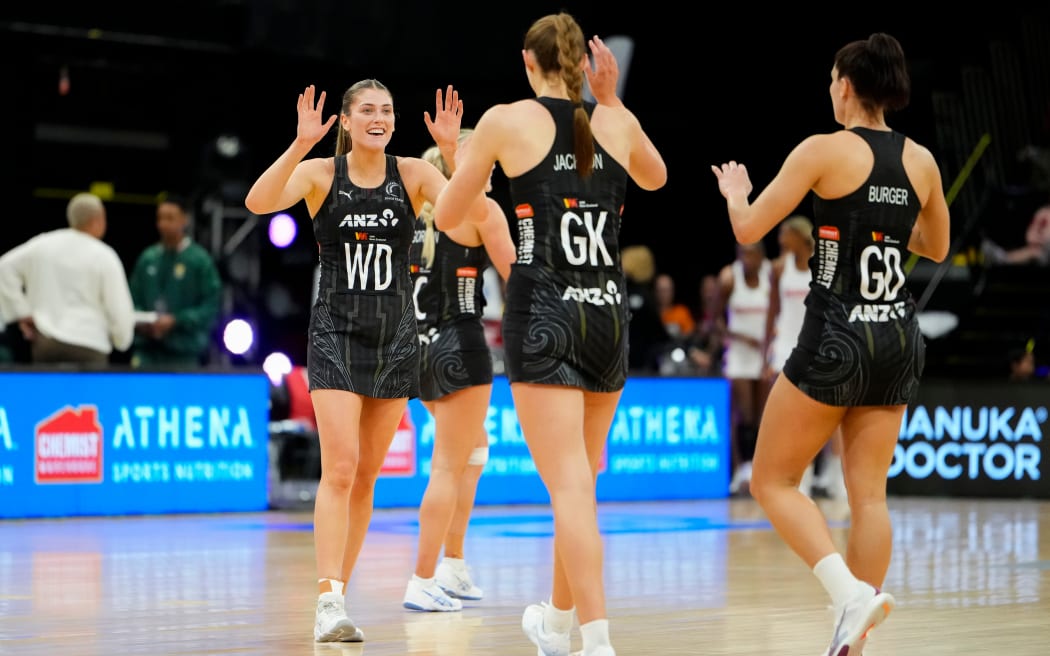 Silver Ferns defenders celebrate.