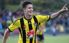 The Phoenix striker Nathan Burns celebrates a goal.