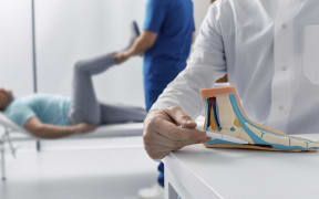 Flatfoot diagnosis. (Photo by PEAKSTOCK / SCIENCE PHOTO LIBRAR / LDA / Science Photo Library via AFP)