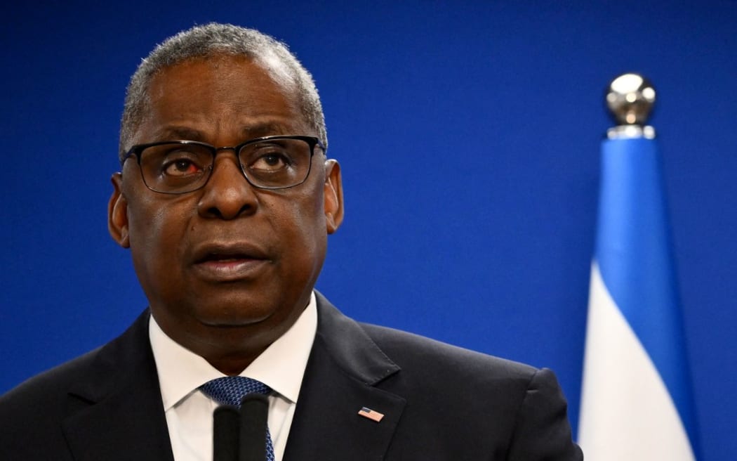(FILES) US Secretary of Defence Lloyd Austin speaks during a joint press conference with Israel's defence minister, in Tel Aviv on December 18, 2023. US Defense Secretary Lloyd Austin was hospitalized earlier this week due to complications from a medical procedure, the Pentagon said January 5, 2024 at a time when Washington is facing a growing crisis in the Middle East. (Photo by Alberto PIZZOLI / AFP)