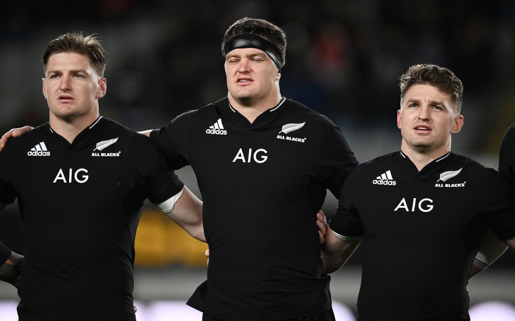 Jordie Barrett, Scott Barrett and Beauden Barrett during the national anthem.