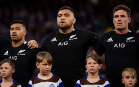 Atu Moli, centre, sings the national anthem  prior to the 2019 Bledisloe Cup opener in Perth.
