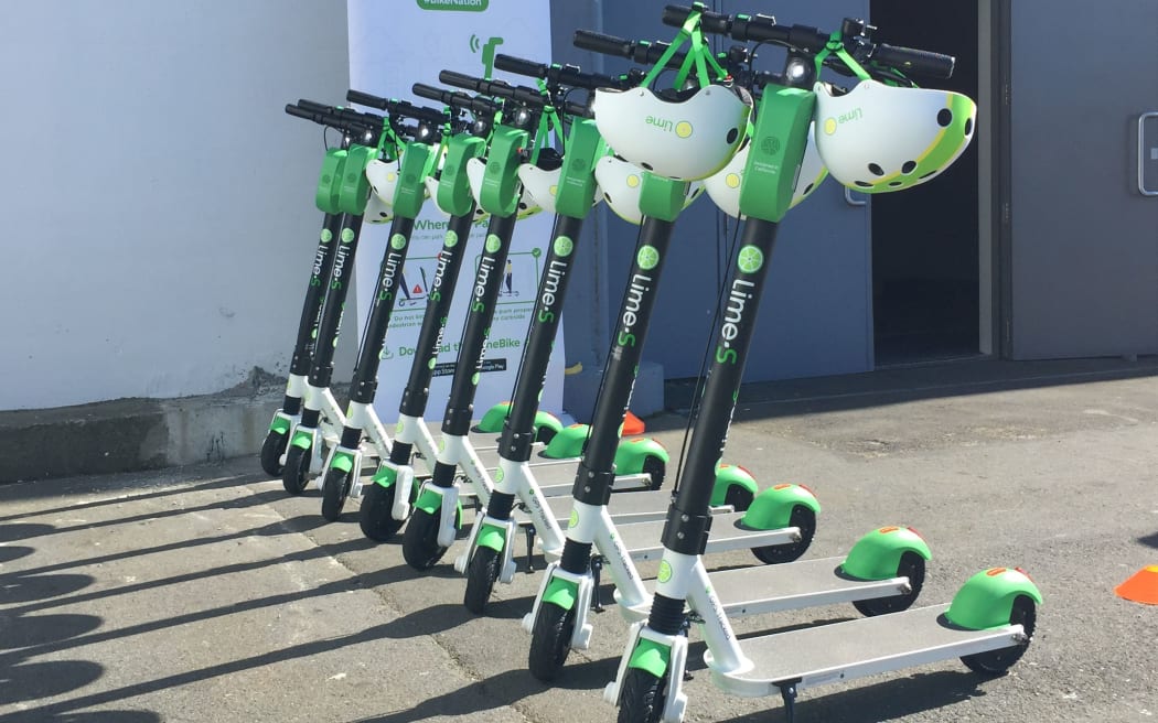 Rack 'em up: Lime scooters for hire outside the TraffiNZ conference on Wellington's waterfront this week - as part of a charm offensive in the capital.