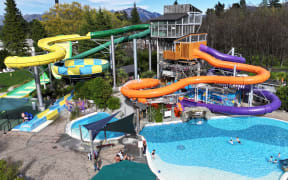 The new waterslides (right) at Hanmer Springs pools have been named the Waiau Winder and Violet Vortex.